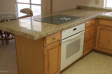 Granite Countertops & Maple Cabinets