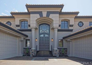 Magnificant entrance with 4 car garage