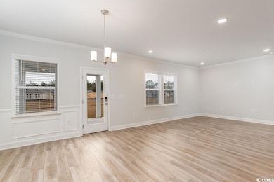 Spare room with light wood-type flooring, ornament