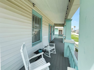 Extra wide front porch spans the entire house.