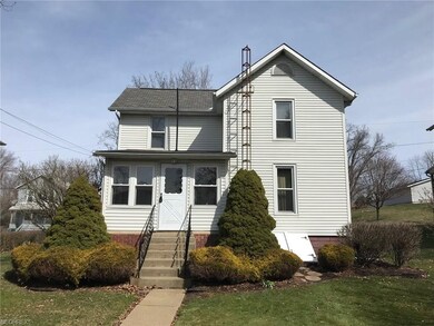 Enter through the back of the home into a charming