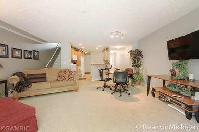 716 Stevenspoint SE unit 30, Byron Center, MI 49315 - photo 3