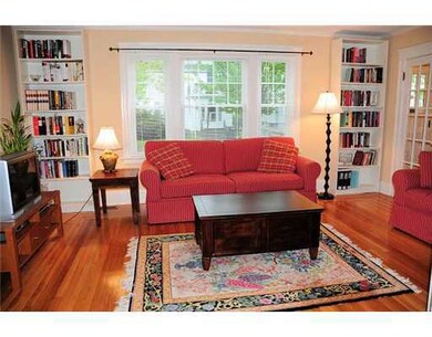 Living Room. Entry hallway with closet leads into