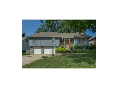 Front of house with Level Driveway.