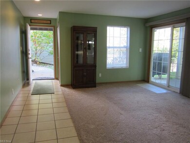 Entryway with light tile flooring and a wealth of 