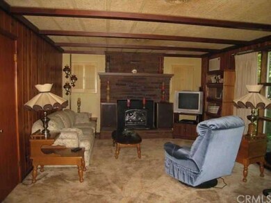 Warm and cozy living room with wood stove insert