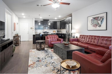 Living room with dark hardwood / wood-style floori