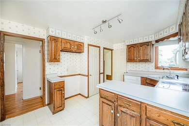 Kitchen Featuring Ample Cabinetry and Tons of Natural Light