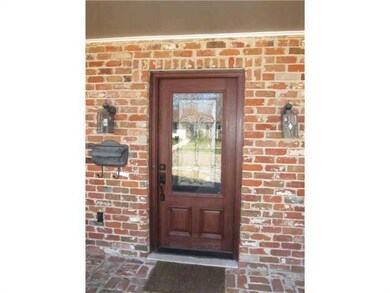 Facade/Exterior Front. Entry.