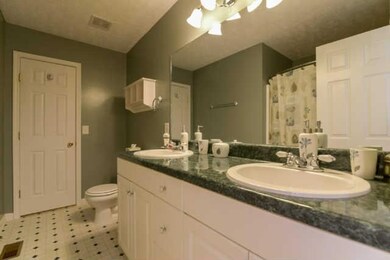 The Master Bath has double vanities, a garden tub 