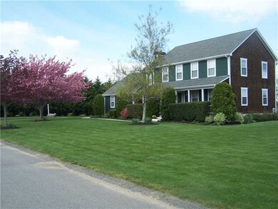 Exterior Front. Angle view from corner of lot  acr
