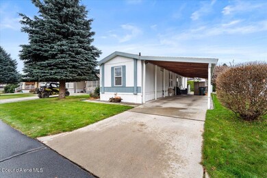 Front of Home with Carport View