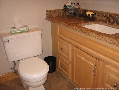 Bathroom. A large full bath located in the hall wa