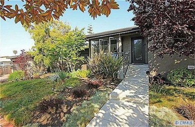 View of the custom landscaping and entry at 120 Ar
