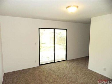 Master Bedroom with sliding doors to the back yard