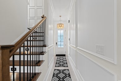 Interior space featuring a notable chandelier and 