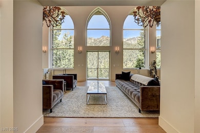 Living room featuring wood finished floors and bas