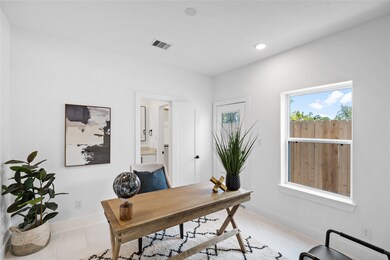 A spacious downstairs bedroom with natural light p