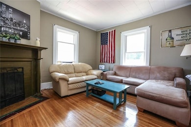 75 Vassar - Living room to front of home with hard