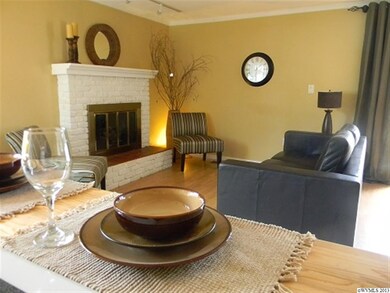 GREAT FAMILY ROOM AREA OPEN TO KITCHEN AND DINING