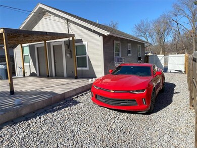 Side of the House through Electric Gate.