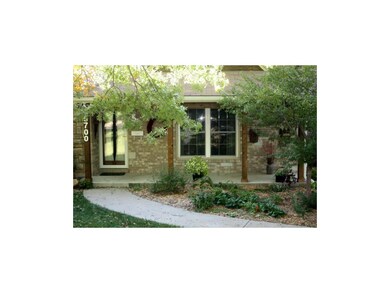 Enjoy your morning coffee on this cozy front porch