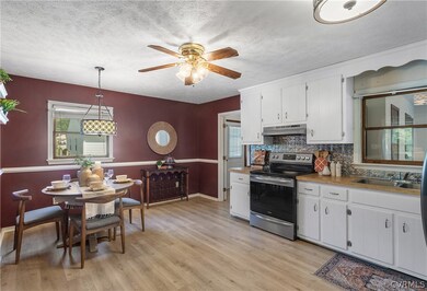 Kitchen featuring stainless steel electric stove,