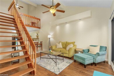 Living room featuring hardwood / wood-style floori
