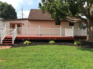 Back of home, professionally landscaped and  paint