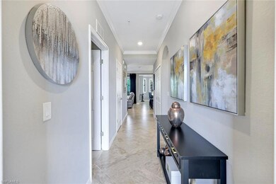 Foyer-entry featuring visible vents, arched walkwa