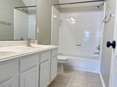 This bathroom features a clean, modern design with