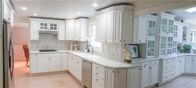 GOURMET KITCHEN WITH STAINLESS STEEL APPLIANCES