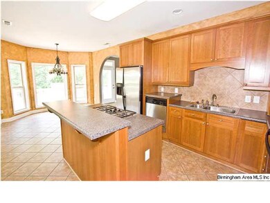 Step-up bar and stainless steal appliances.