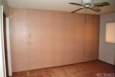 The large guest bedroom has its own closet and win