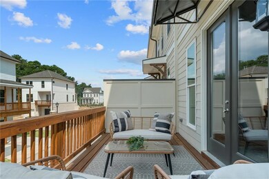 Relax and unwind on this oversized deck.  Photo no