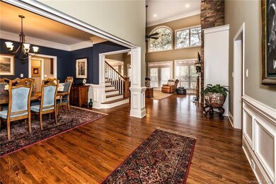 View from the foyer shows the open floor plan with