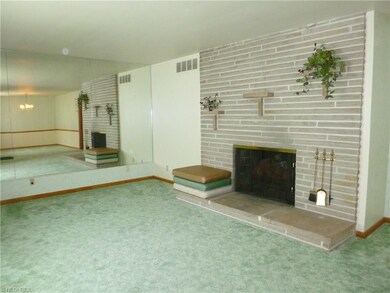 Beautiful living room with brick fireplace (decora