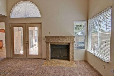 Living Room French Doors & Fireplace