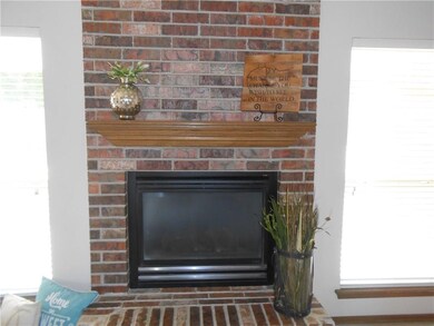 Enjoy gathering around the fireplace.  This firepl