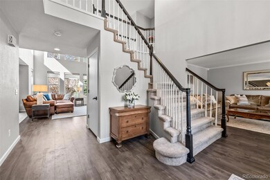 Gorgeous Statement Entry with hard surface floors throughout