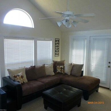 Sun room opens to private rear deck.