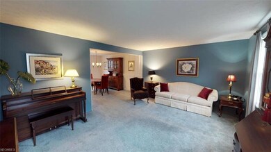 The formal living room speaks of tradition and flo