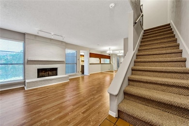 Stairs to bedrooms and remodeled bath up..