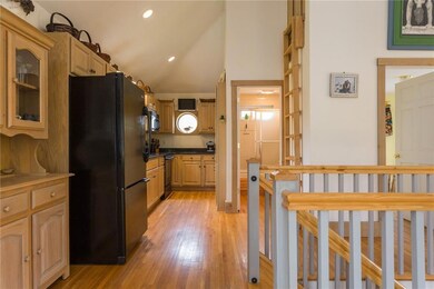 A view of the kitchen. Note the...