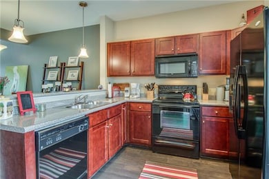 Spacious kitchen with plenty of cabinets for all of your storage needs