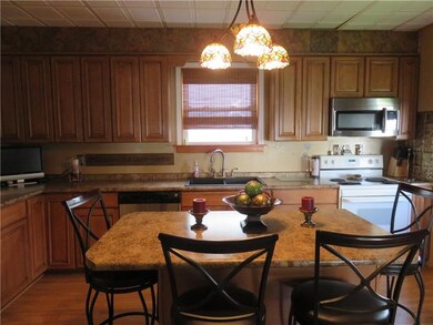 Modernized kitchen with built-in appliances and ki
