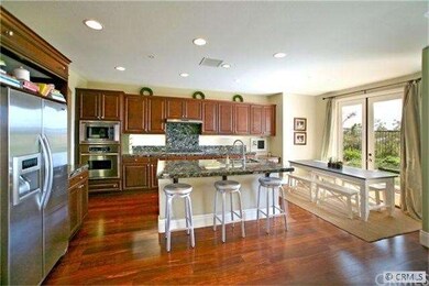 Kitchen w/ Center Island Eating Area & Dinning Are