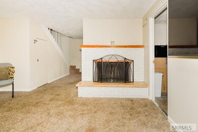 another wood fireplace in basement