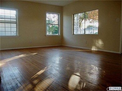 Large bright windows at the spacious living room
