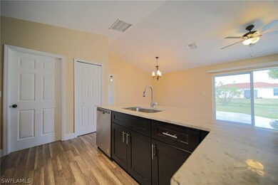 The Kitchen Has Granite Countertops, Tile Backspla